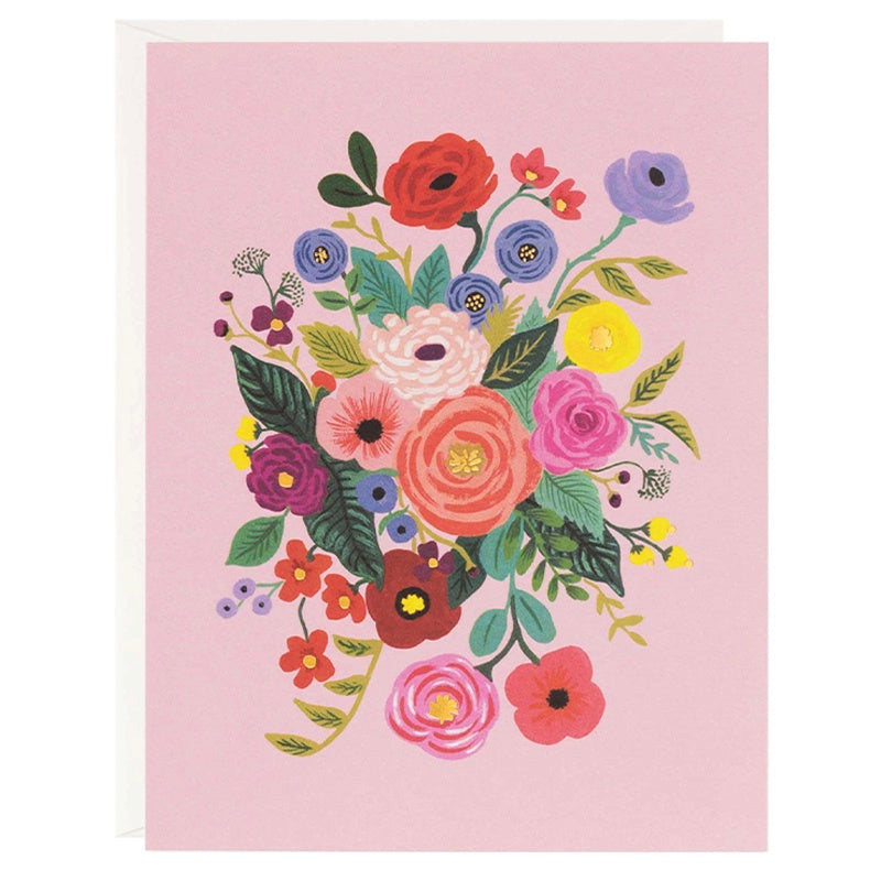 Card with a colorful floral arrangement on a pink background