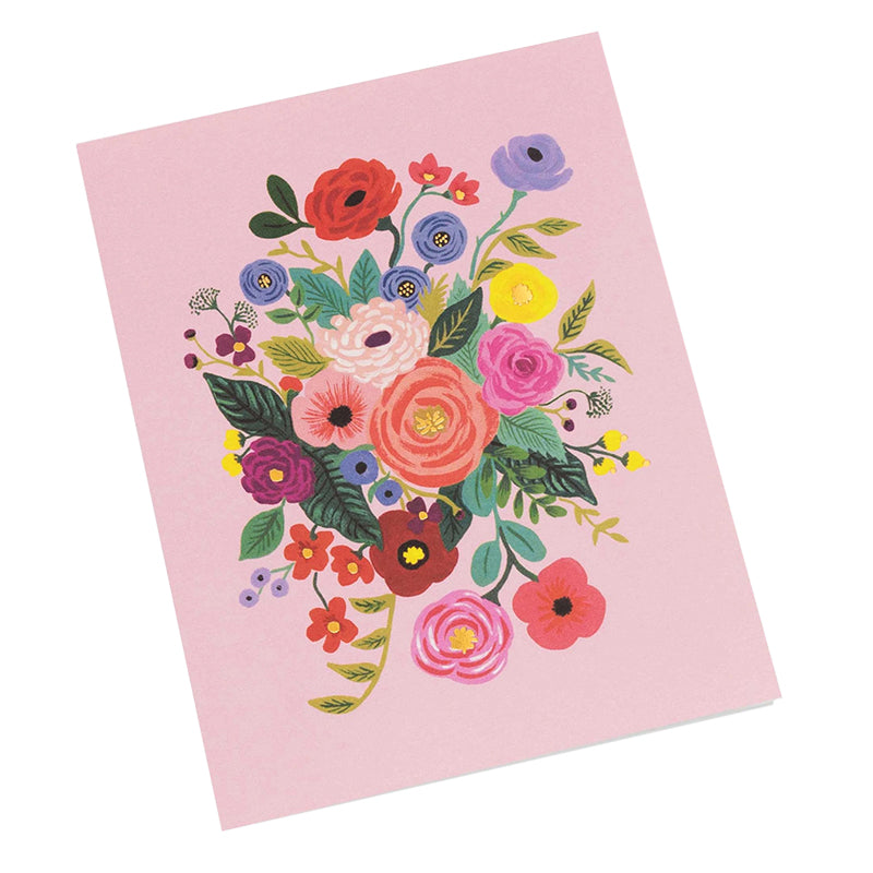 Card with a colorful floral arrangement on a pink background